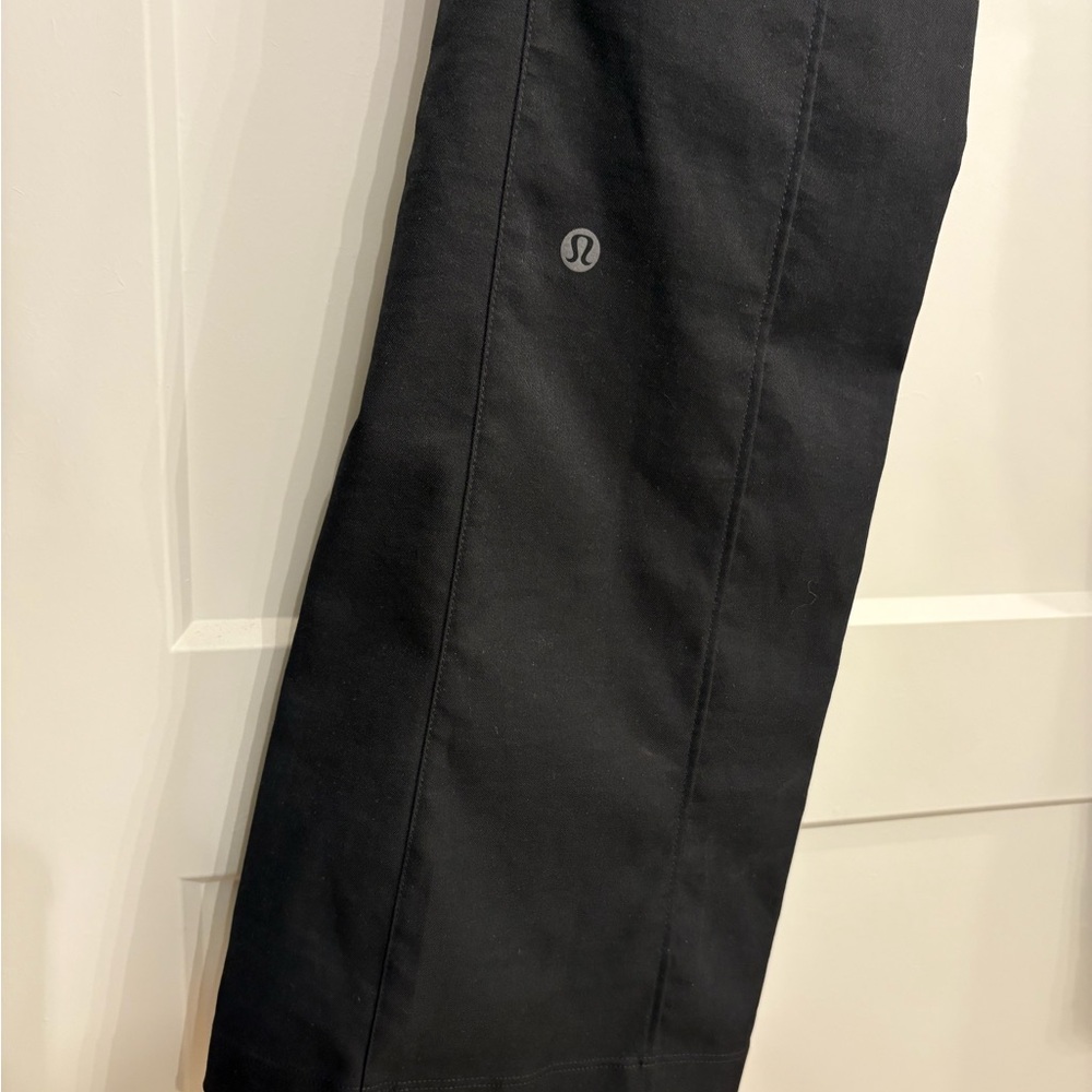 Lululemon Athletica Black Trousers. Flare- Leg. Size 4 Long. BNWT.